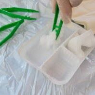 Wound Care Supplies Australia Sourced 1 using saline and gauze with a dressing tray
